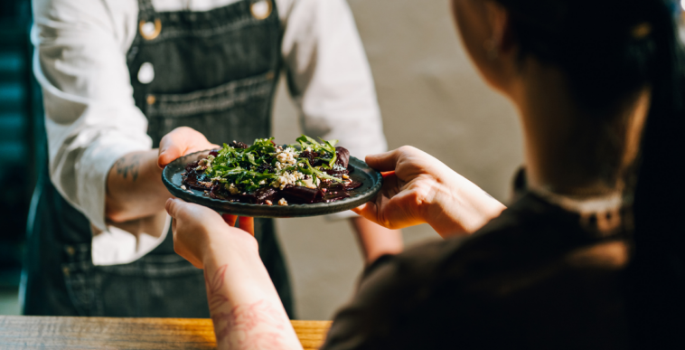 customer is served food in restaurant