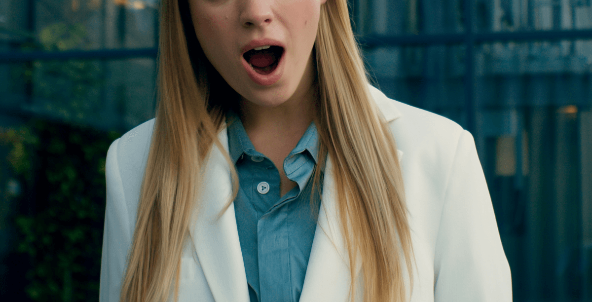 shocked young woman in office