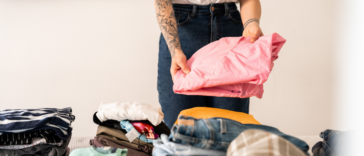 woman sorting through clothes