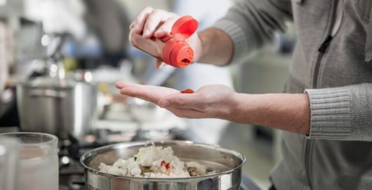 man added Tajín to dish