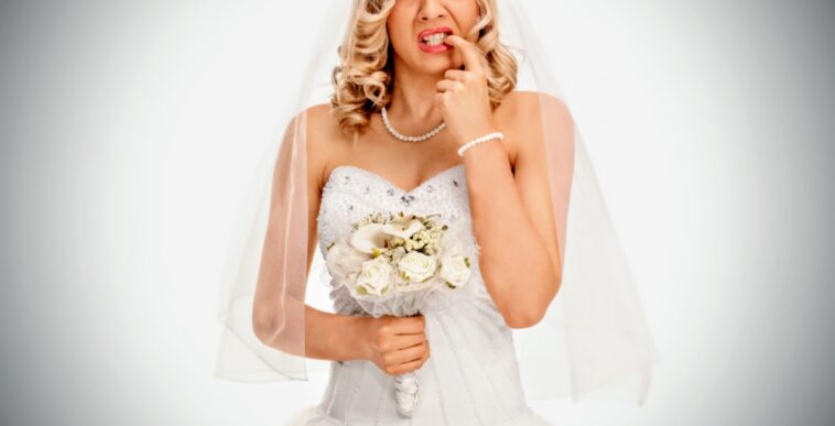 anxious bride biting her finger